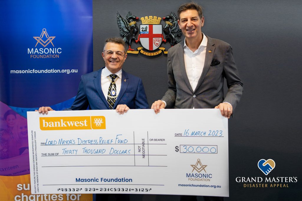 Masonic Foundation Chairman, Daniel Ganon presenting Perth Lord Mayor, Basil Zempilas with $30,000 for the Kimberley Flood victims through the Lord Mayor's Distress Relief Fund.